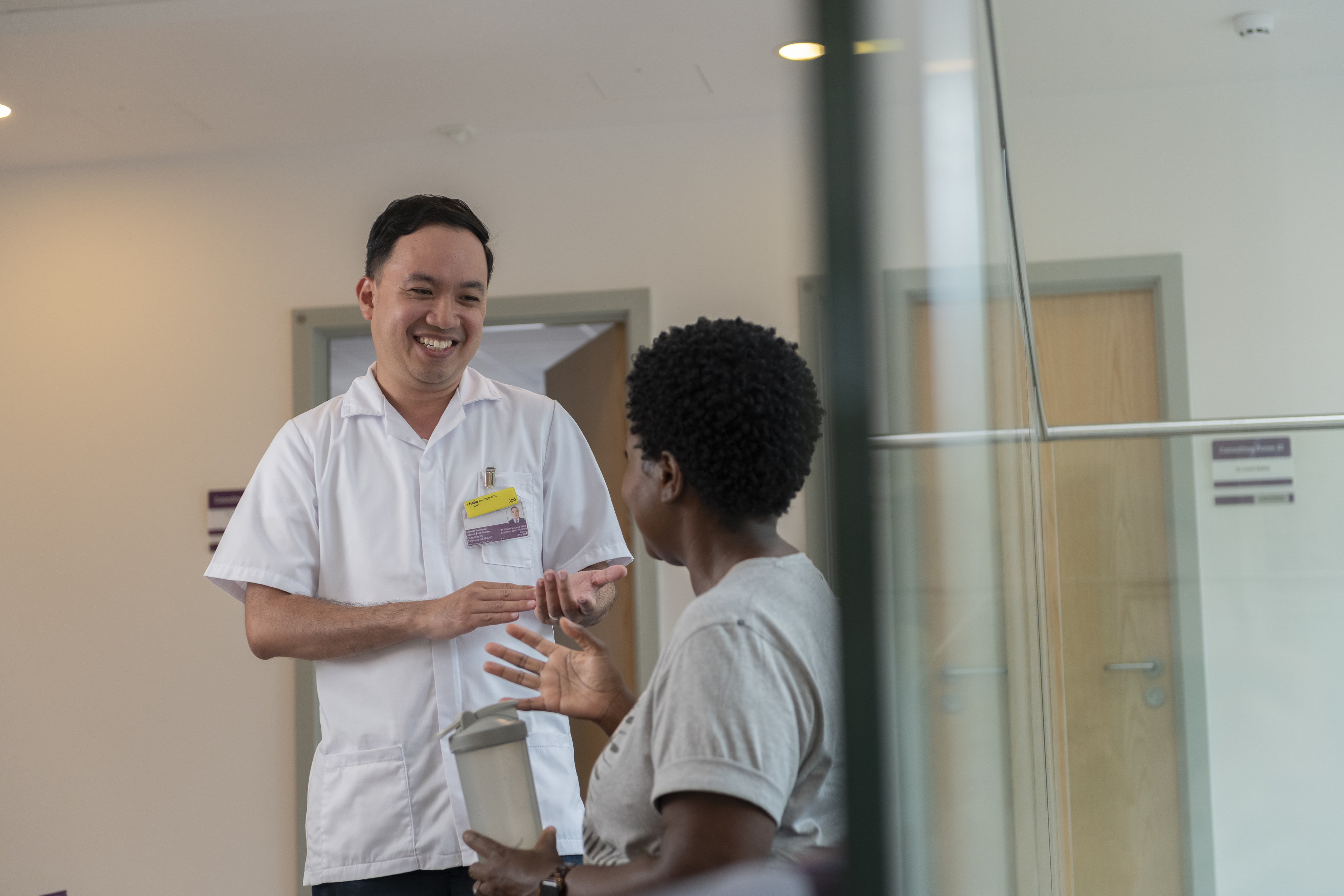 New Victoria Hospital staff talking to patient