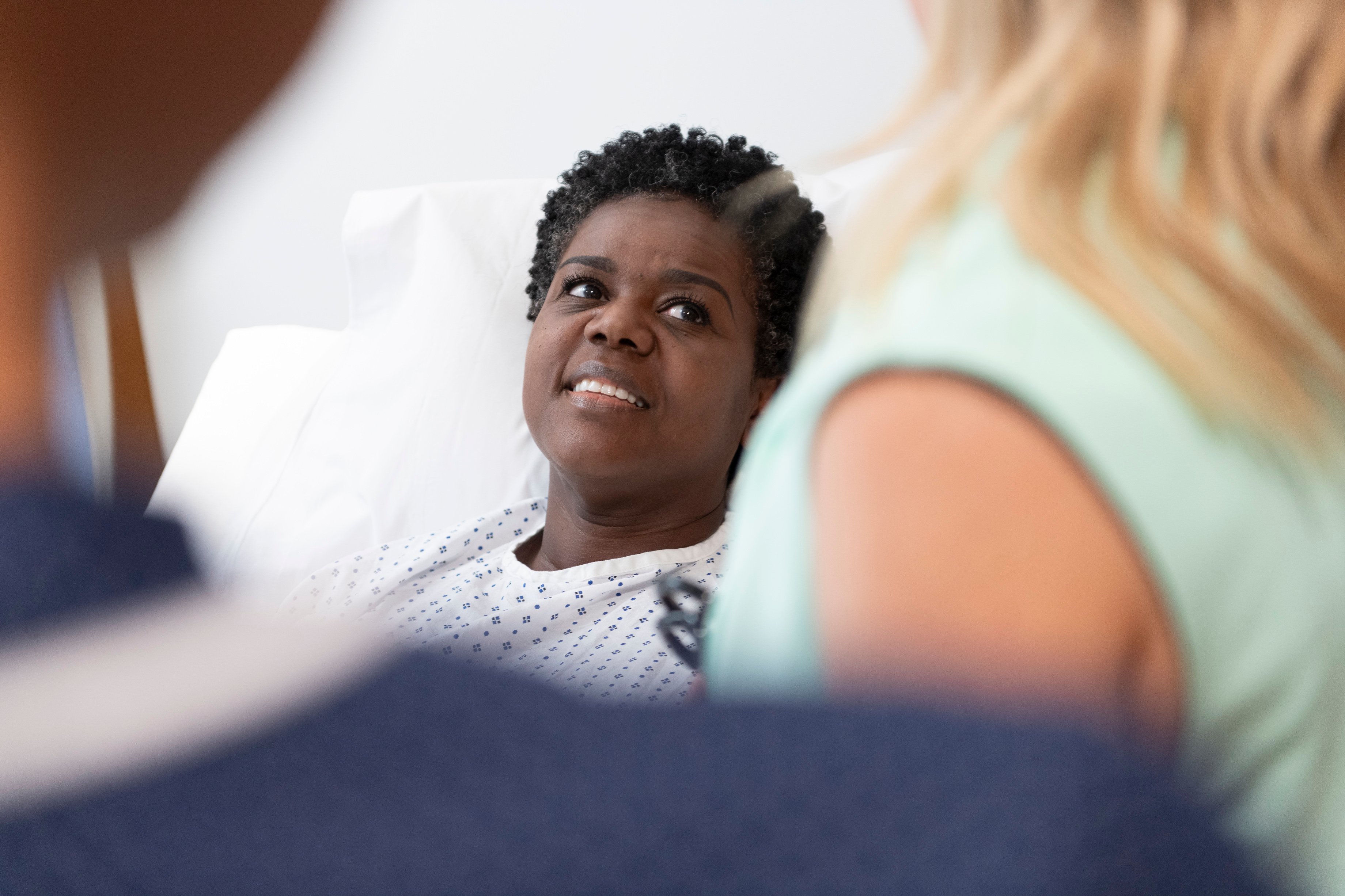 women in a hospital bed