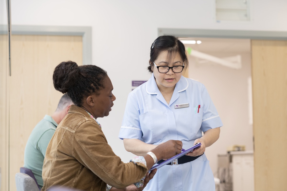 New Victoria Nurse Speaking To A Patient For Breast Lumpectomy